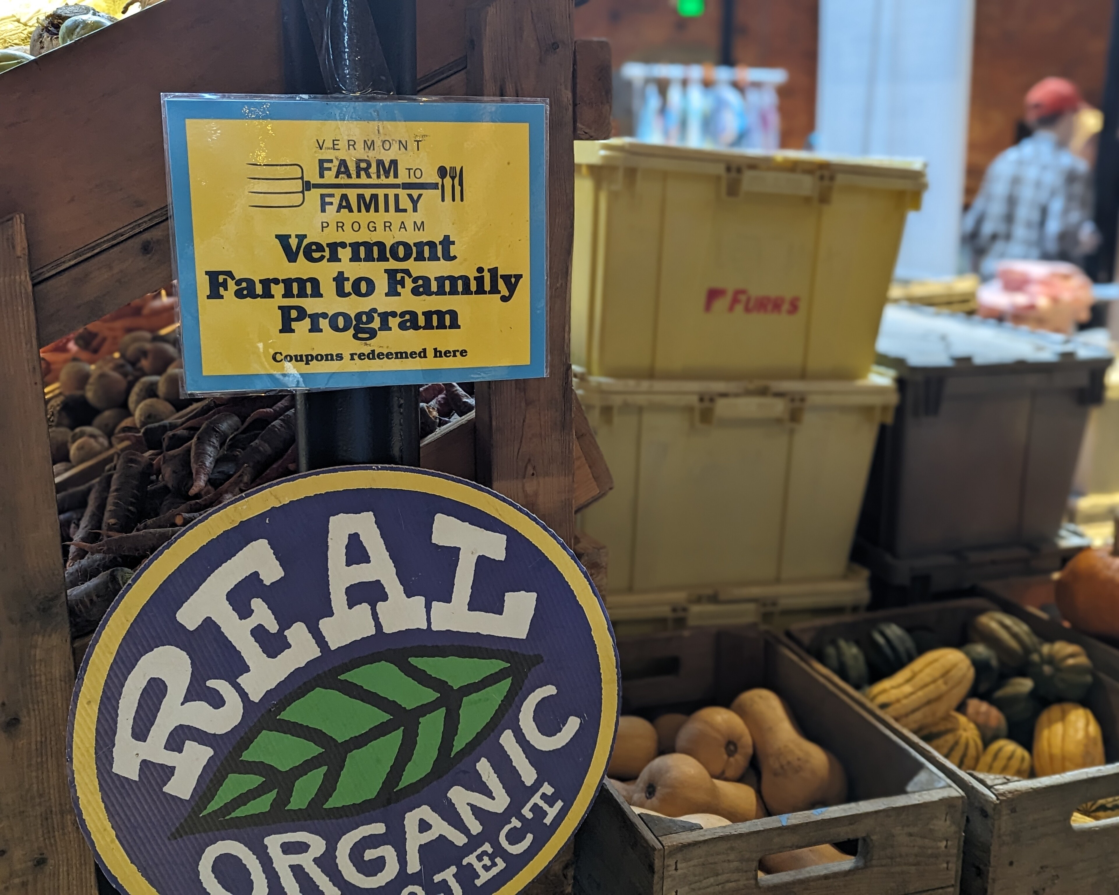 Farm to Family sign at a local farmer's market